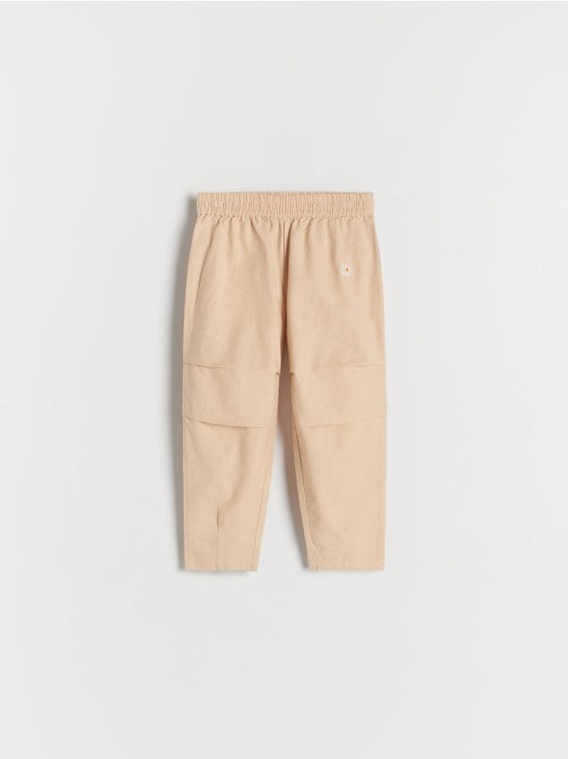 Parachute trousers with embroidery detail - RESERVED