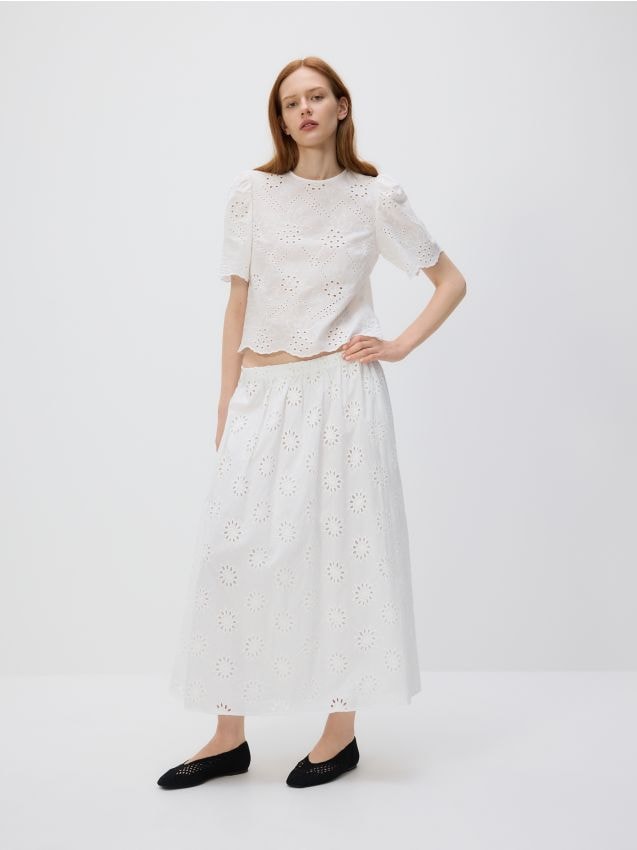 Ajourblouse met pofmouwen - RESERVED