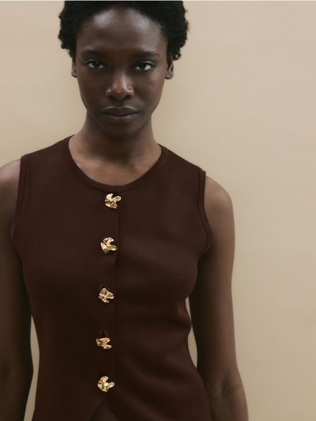 LADIES` VEST - RESERVED