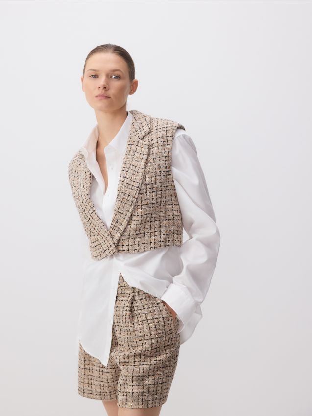 LADIES` VEST - RESERVED