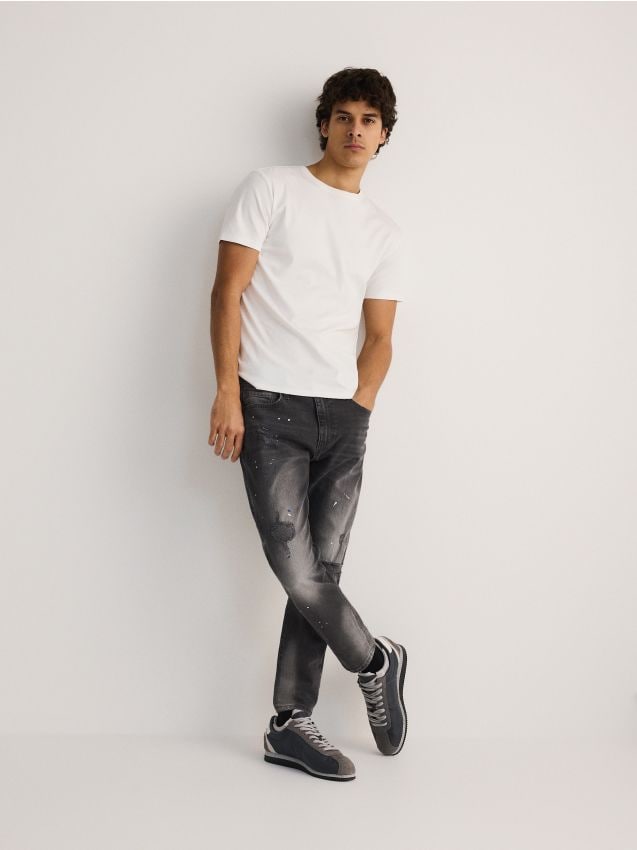 Reserved - Blugi carrot slim cu aspect deteriorat - gri