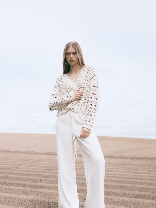 Losvallende broek met strikceintuur - RESERVED